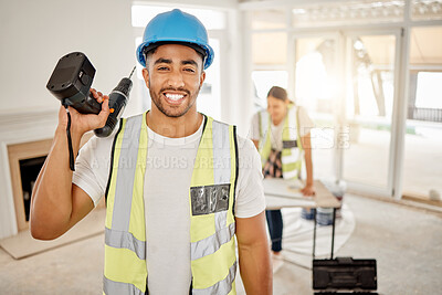 Buy stock photo Portrait of man, construction and home renovation with drill, helmet and working mindset in apartment. Yes, smile and diy renovations, happy handyman in safety and building project tools in new house
