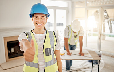 Buy stock photo Portrait of woman, construction and home renovation with thumbs up, helmet and smile in apartment. Yes, positive mindset and diy renovations, happy female in safety and building project in new house.