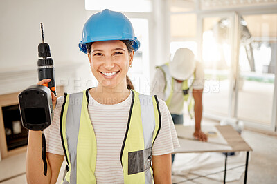 Buy stock photo Portrait of woman, construction and home renovation with drill, helmet and smile in apartment. Yes, positive mindset and diy renovations, happy female in safety in building project tools in new house