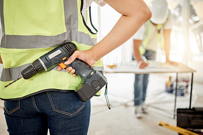 Buy stock photo Construction, handyman and drill in hand for maintenance or carpenter work. Back of engineer, constructor or contractor person with electric power tools at building site for home renovation project