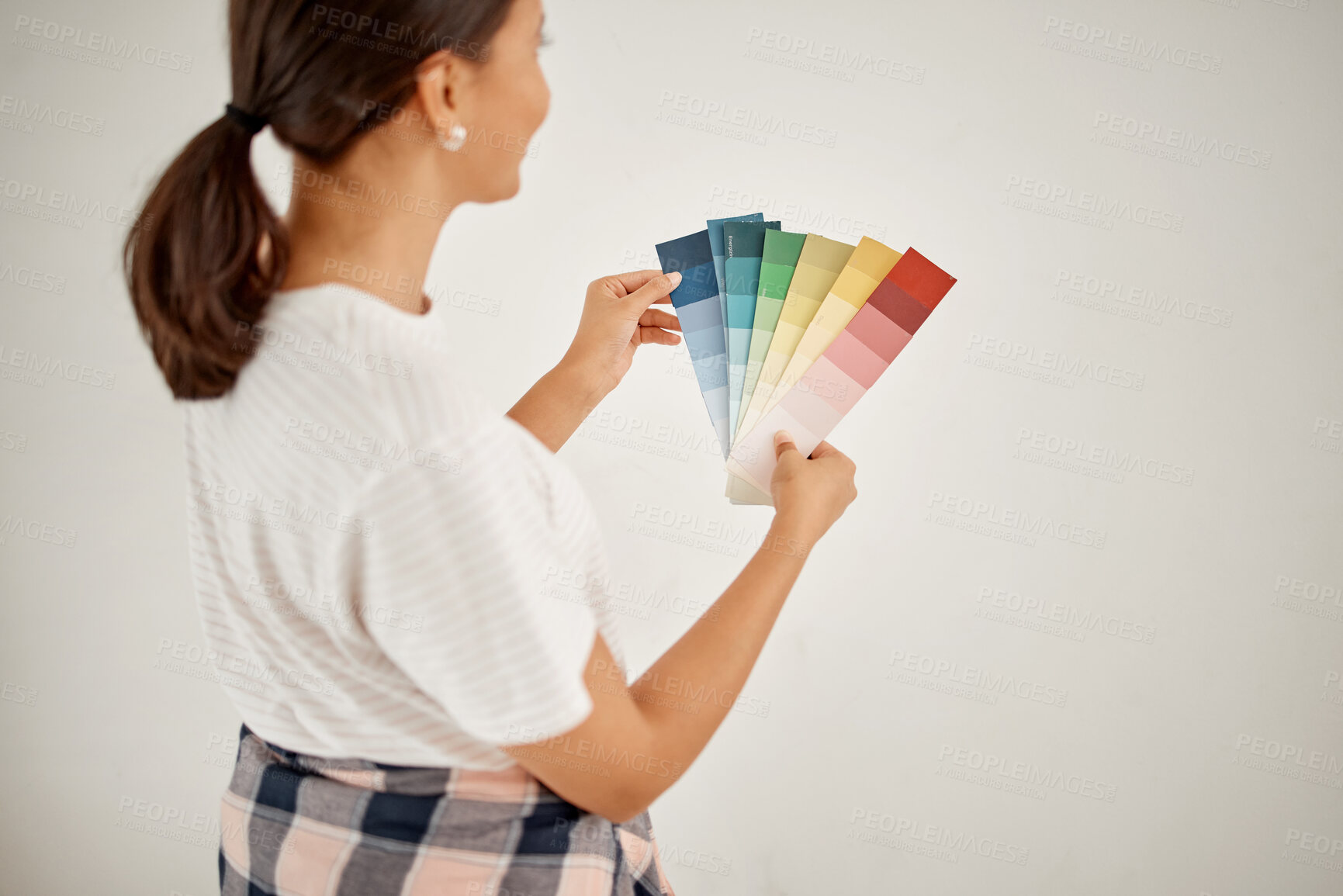 Buy stock photo Renovation, woman and wall colours with chart at home with creativity for interior design. Female designer, thinking and colour card for paint for a house with guide for idea with maintenance.