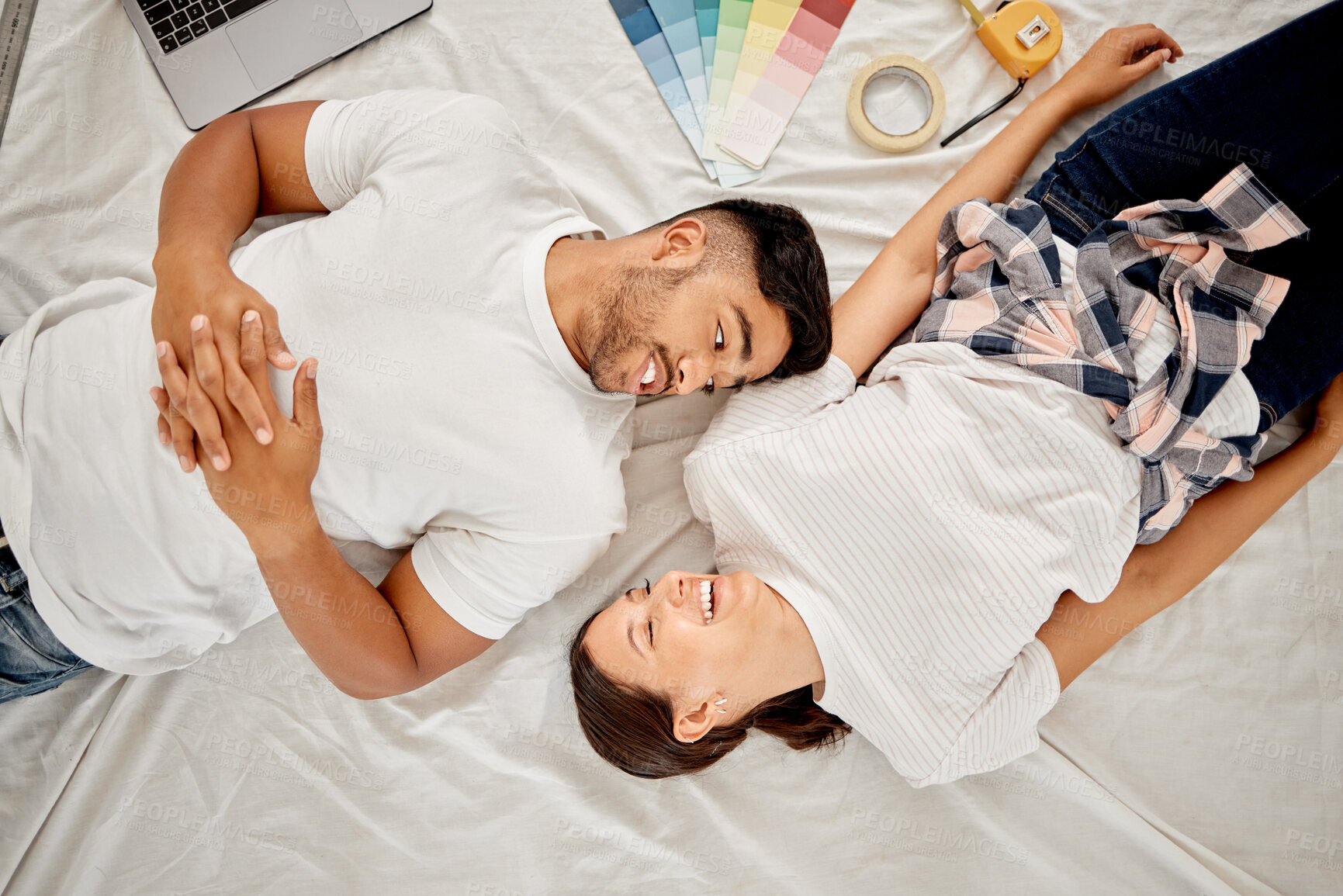 Buy stock photo Couple, happy and relax on floor for home renovation, improvement and break for working in living room for upgrade, Man, woman and together with laptop for online ideas on remodeling and partnership.