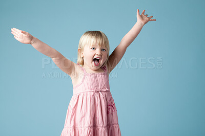 Buy stock photo Studio, child or girl excited with scream for surprise, happy or isolated on blue background. Model, backdrop or kid for announcement with motor skills for wow, omg or shocked with mind blown