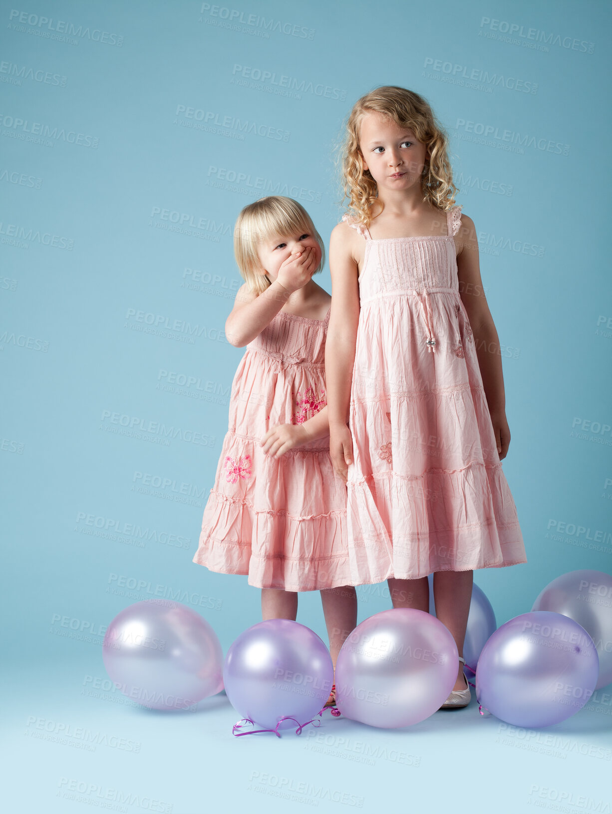 Buy stock photo Kids, sisters and studio with balloons for fashion or development, laugh or thinking with clothes. Children, girls and inflatable on backdrop with style for youth, happy in London or England with fun