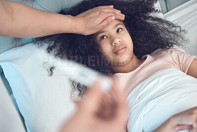 Buy stock photo Shot of an unrecognizable man taking his daughters temperature at home