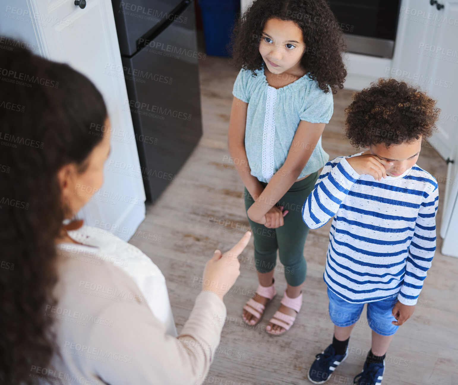 Buy stock photo Home, naughty and mother with kids, angry and bad behavior with conflict, talking or discipline. Apartment, family or single parent with children, siblings or mama with scolding, stress or frustrated