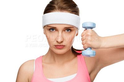 Buy stock photo Shot of a young woman using weights against a studio background