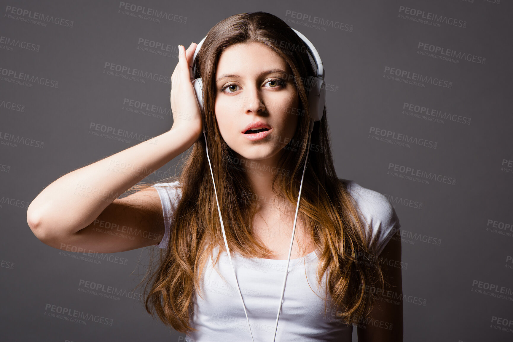 Buy stock photo Studio portrait, woman and headphones for music with hip hop audio, radio app and online playlist. Girl, gen z and listening for podcast with sound track and streaming song media by grey background