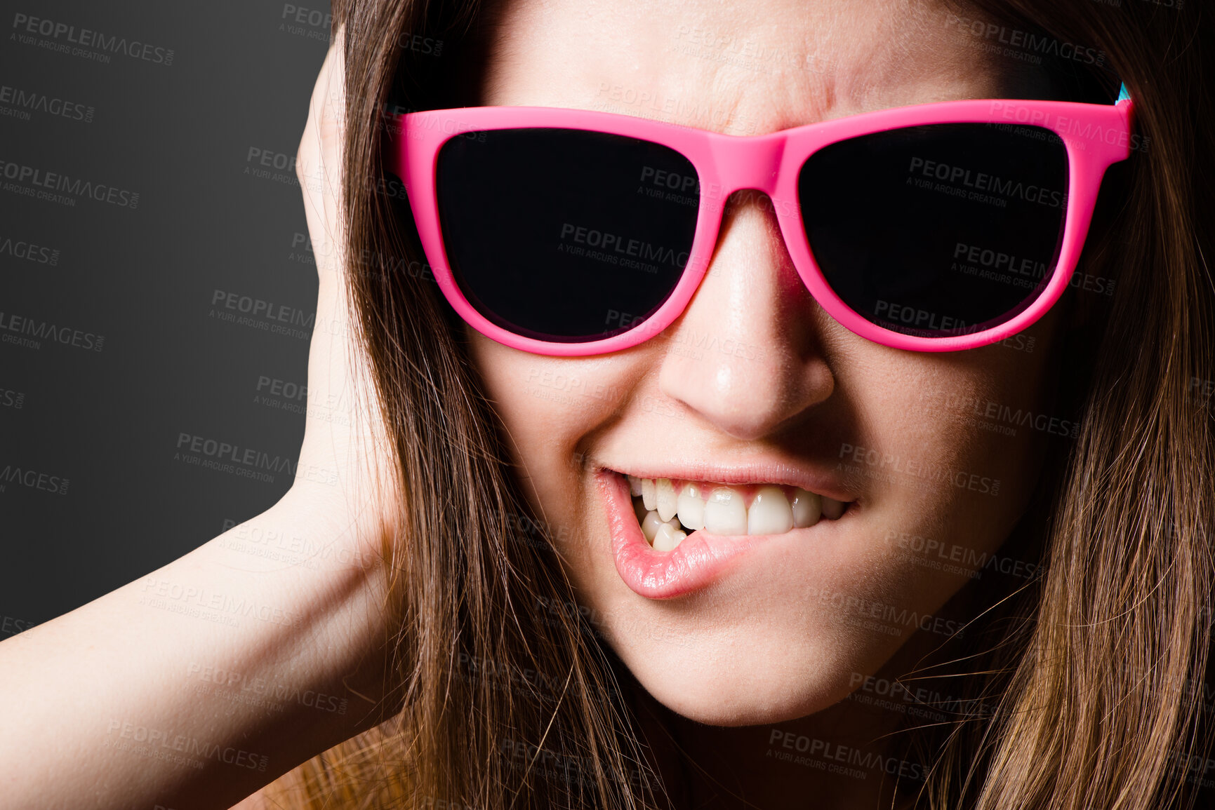 Buy stock photo Black background, funny face and girl with sunglasses, studio and style of Gen z, fashion and accessory. Confidence, crazy and person with eyewear, color and trendy in weekend, shades and portrait