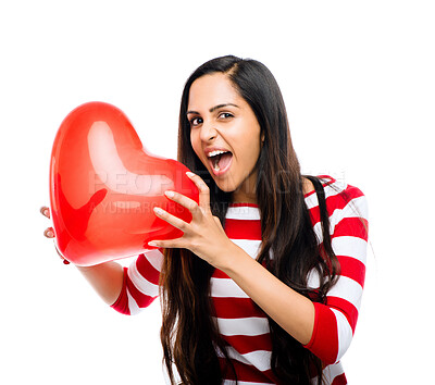 Buy stock photo Shot of a beautiful young woman holding a heart shaped balloon against a studio background