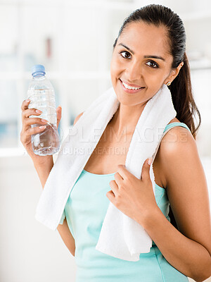 Buy stock photo Athlete, portrait and woman for fitness with towel, training and sports for health with water. Face, bottle and strong female person in sportswear and sweat cloth, exercise or performance in studio