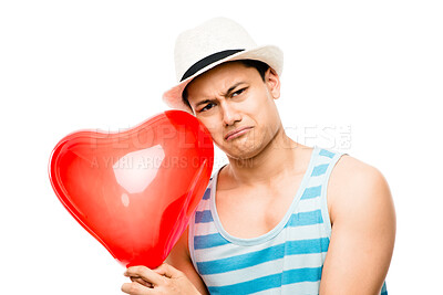 Buy stock photo Man, portrait and balloon of heart in studio, sad and stress after breakup on white background. Male person, lonely and mental health for love emoji or peace, shape and anxiety for symbol of romance