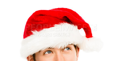 Buy stock photo Man, santa hat and eyes in studio with thinking for festive holiday, ideas and xmas by white background. Person, memory and red cap for Christmas, party and event with culture, tradition and vision