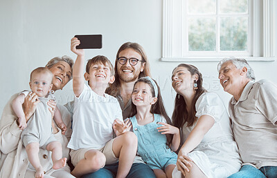 Buy stock photo Selfie, picture and big family in home with smile or care together with happy memory for social media. Senior grandparents, mom and dad in photo with children siblings for bonding, support and love 