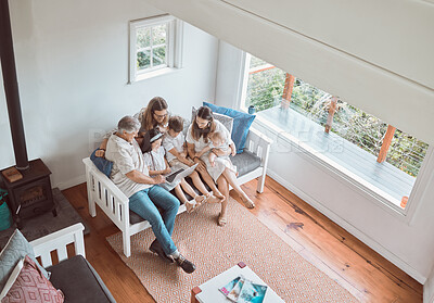 Buy stock photo Happy family, laptop and bonding in lounge with children, streaming or watching film on weekend in house. People, kids and home for connection, above and relax with parents, playful and cheerful