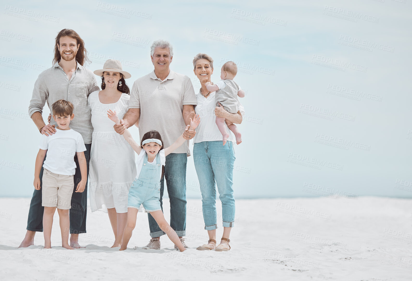 Buy stock photo Shot of a family spending a day at the beach