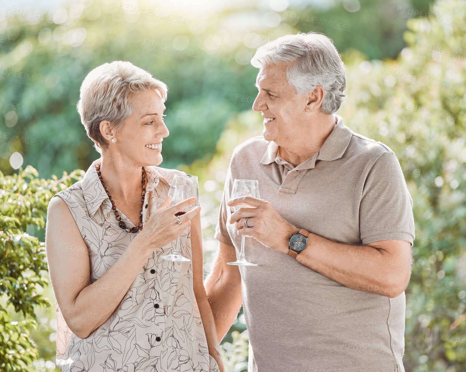 Buy stock photo Cheers, park and senior couple with wine for anniversary, romantic date and toast for commitment. Marriage, retirement and elderly man and woman with alcohol for celebrate, bonding and relax outdoors