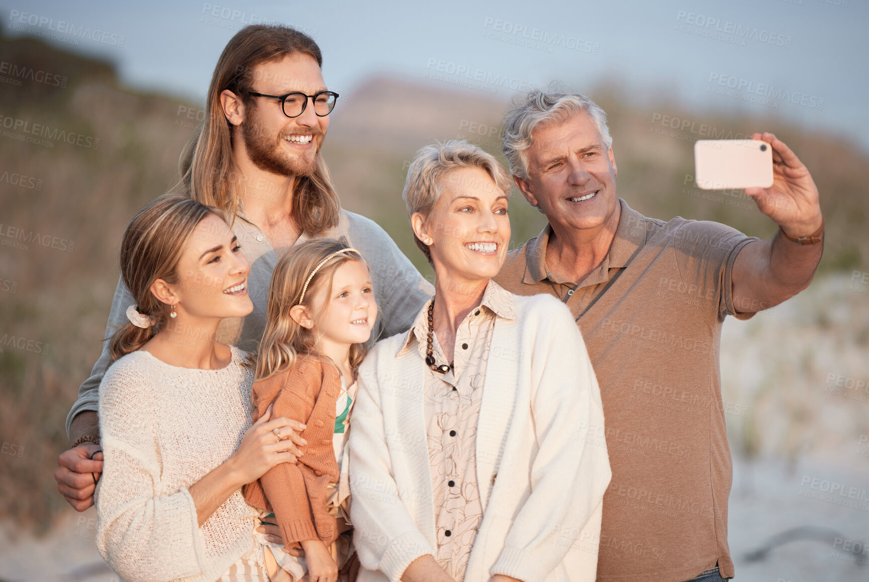 Buy stock photo Beach, selfie and grandparents, parents and child by sea for bonding, relax and travel together in nature. Family, memory and happy mom, dad and girl take picture on holiday, vacation and adventure