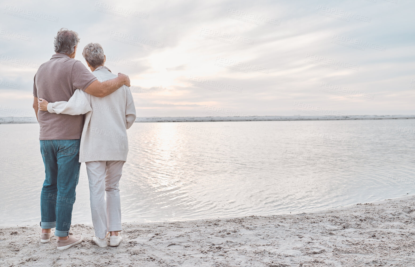 Buy stock photo Hug, back and senior couple by beach to relax on holiday, vacation and romantic adventure together. Marriage, travel and man and woman embrace for affection for bonding, relationship and commitment