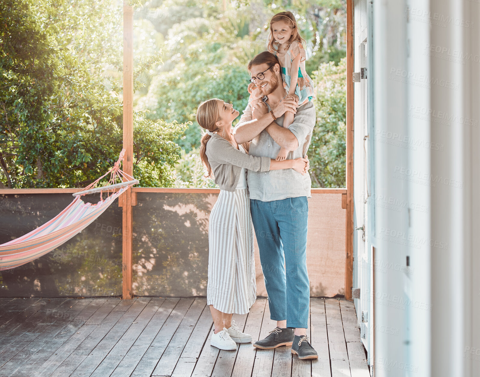 Buy stock photo Home, porch and family with love, care and gratitude with insurance cover, bonding together and nature. Apartment, outdoor and parents with kid, daughter and mother with father, real estate and smile