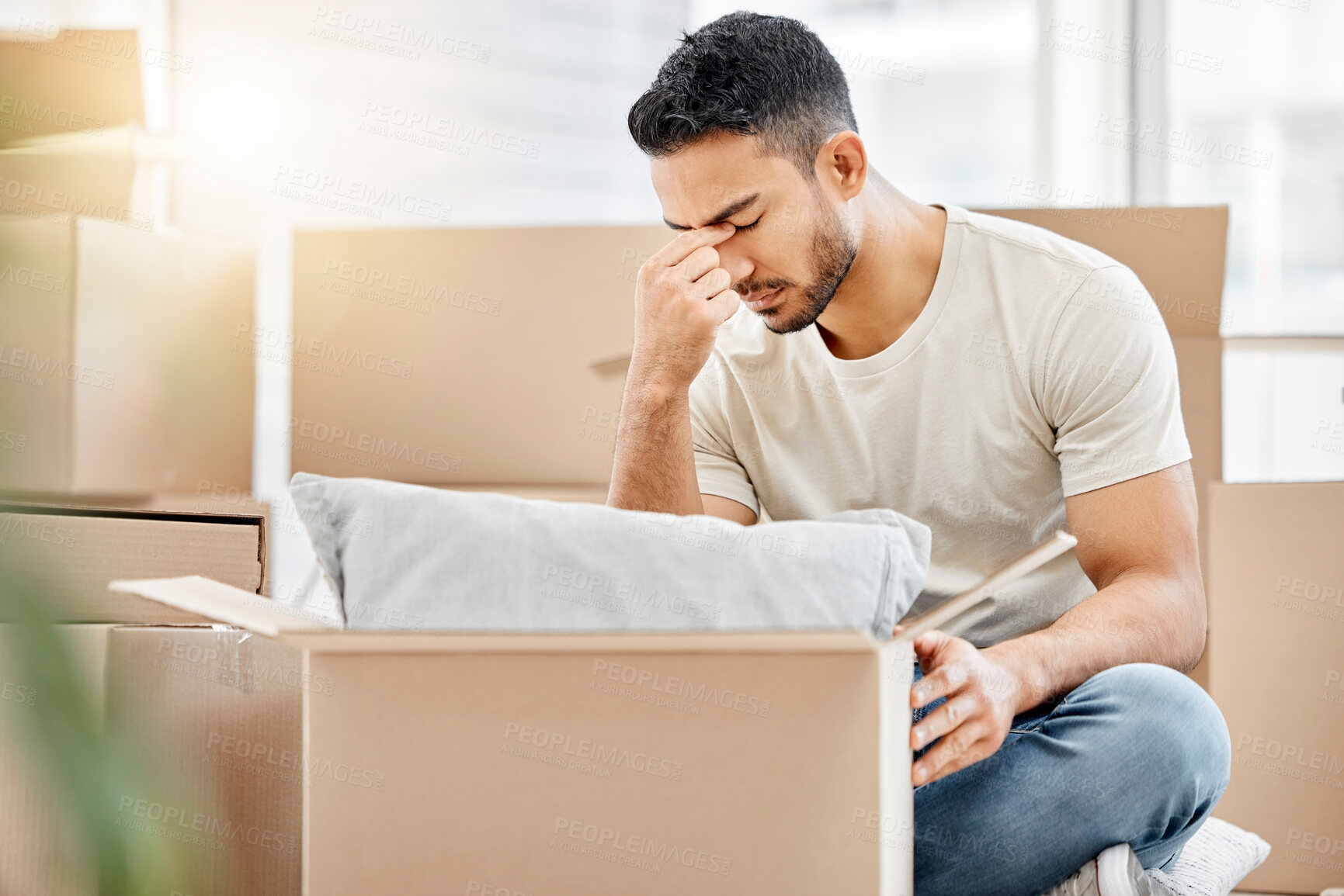 Buy stock photo Man, boxes and stress for moving house, fatigue and headache from real estate or mistake. Frustrated, anxiety and male person in new apartment or property with fear for investment, debt and rent