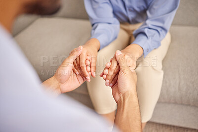 Buy stock photo Home, couple and holding hands for empathy, apology and confession on couch in living room. Married people, wife and cheating husband for sorry, regret and request for second chance on sofa in house