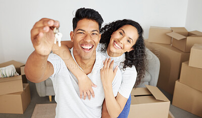 Buy stock photo Portrait, key and happy couple moving in new home for real estate, mortgage and investment together. Face, woman and laughing man rent property, apartment and excited for relocation to dream house