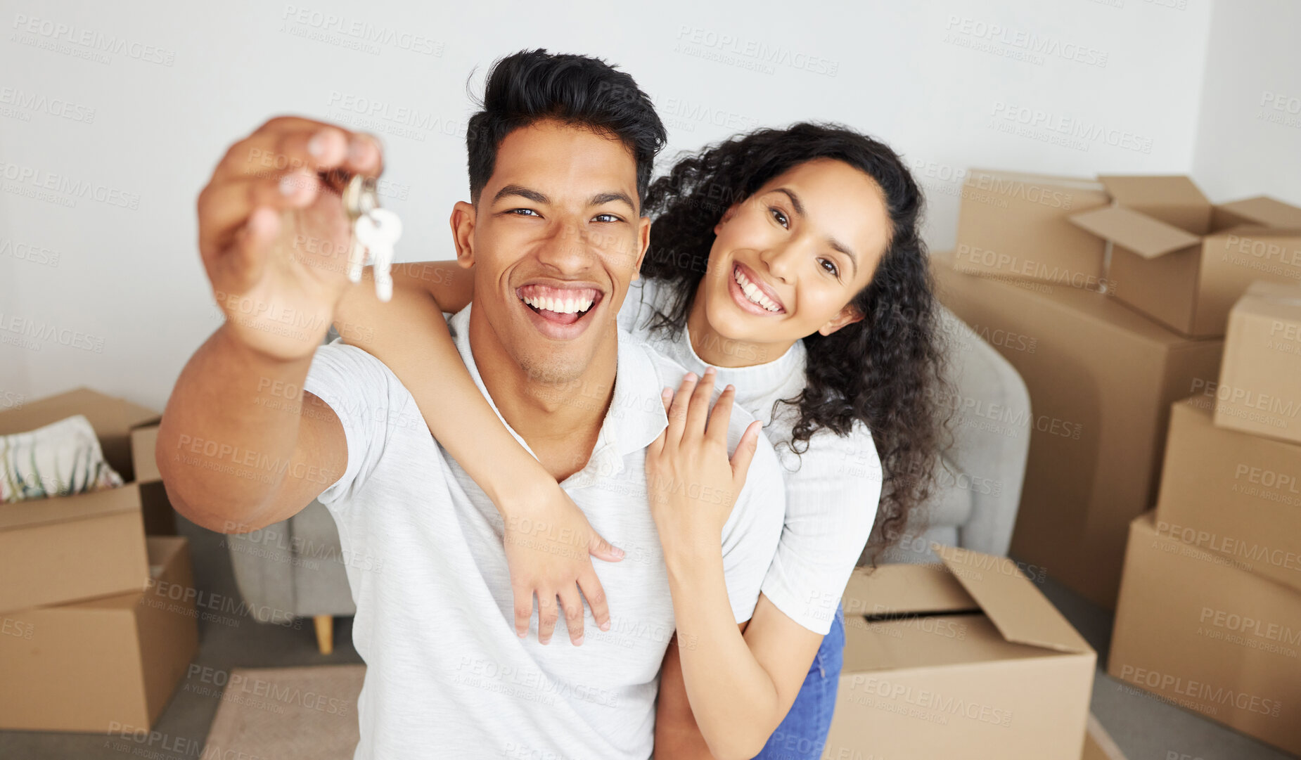 Buy stock photo Portrait, key and happy couple moving in new home for real estate, mortgage and investment together. Face, woman and laughing man rent property, apartment and excited for relocation to dream house