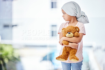 Buy stock photo Healthcare, teddy bear and child cancer patient holding her toy for support or comfort. Medical, recovery and girl kid with leukemia standing after treatment or chemotherapy in a medicare hospital.