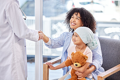 Buy stock photo Shot of a doctor having a consultation with a little girl in a clinic
