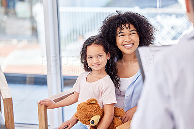 Buy stock photo Mom, girl and happy in clinic with doctor for consultation or checkup with clipboard or document for information. Parent, daughter and medical at reception or waiting area for healthcare and wellness