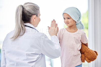 Buy stock photo Cancer, high five and doctor with kid support, healthcare service and success or empathy, courage and healing in hospital. Girl or sick kid and pediatrician or medical woman helping or hands together