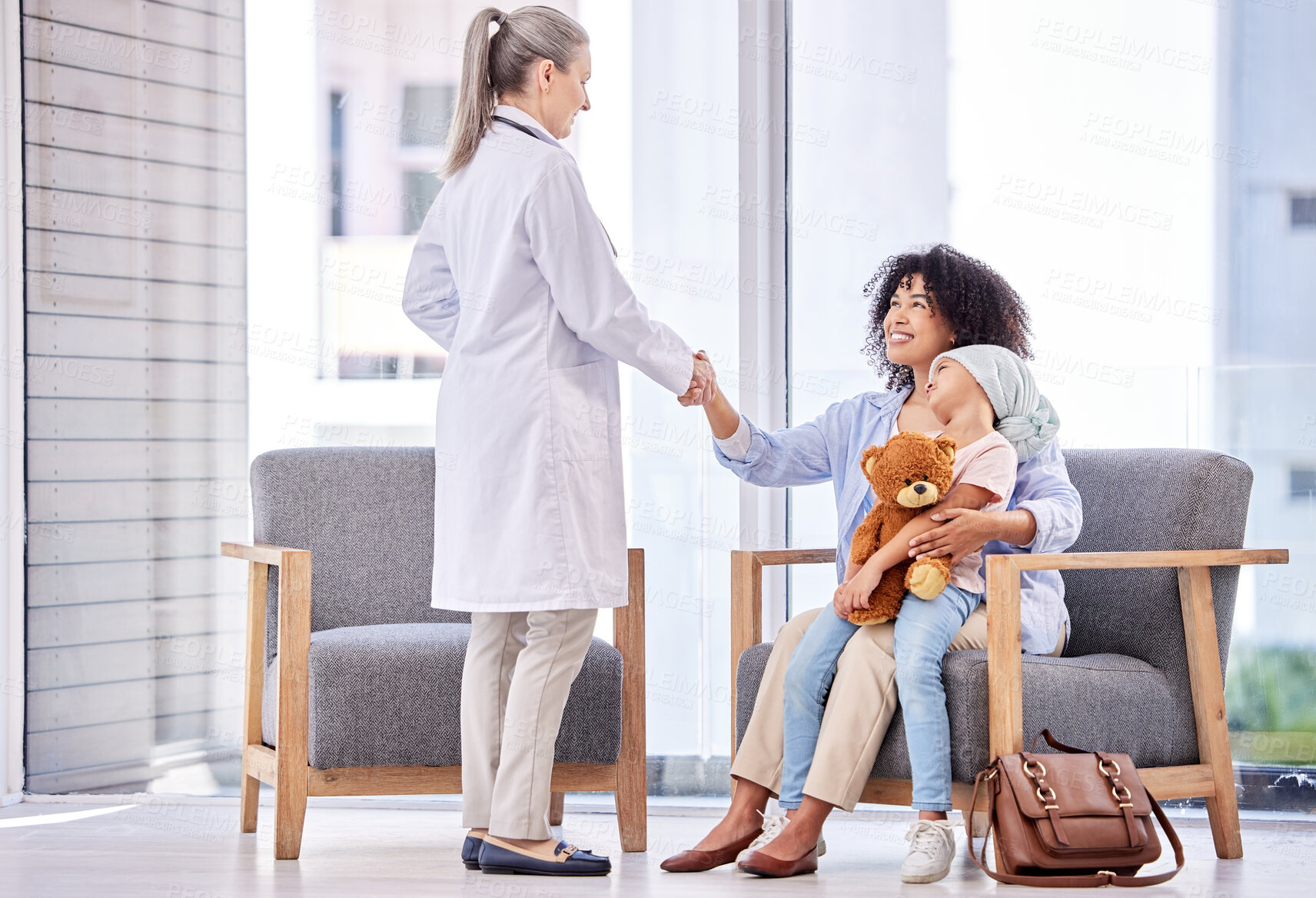 Buy stock photo Child, mother or shaking hands with doctor in clinic for welcome, introduction or healthcare consultation. Oncology, medical expert and woman or cancer patient with handshake for radiation treatment