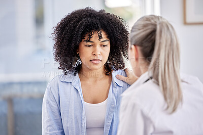 Buy stock photo Shot of a female doctor comforting her patient in a office