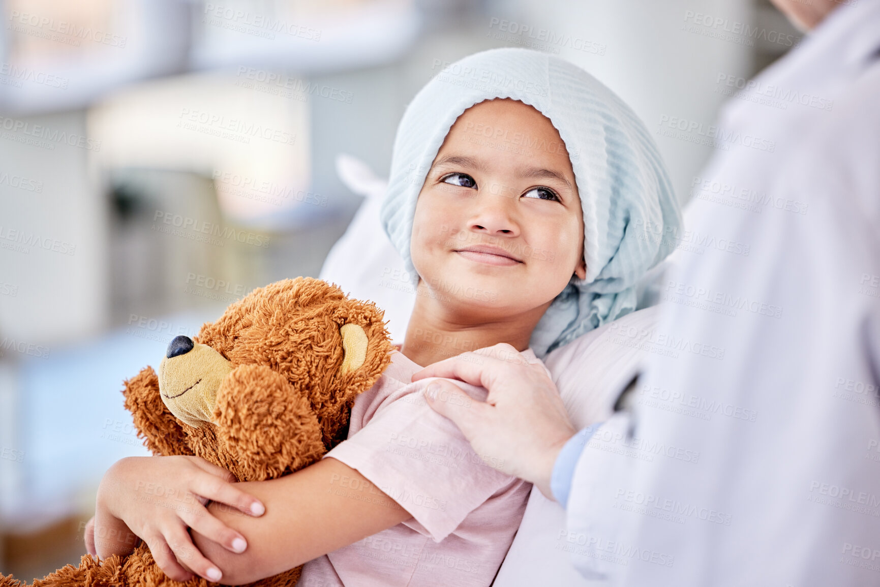 Buy stock photo Cancer patient, child and doctor with support, healthcare service and hand for empathy, love and healing in hospital bed. Happy, sick girl or kid listening to pediatrician or medical person helping