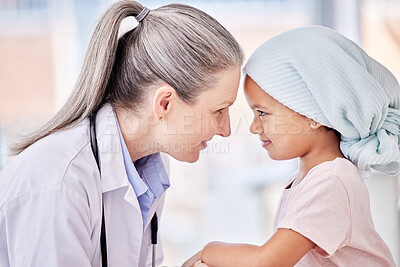 Buy stock photo Smile, doctor and child on bed in hospital for children, health and pediatrician with support in cancer treatment. Pediatrics, healthcare and kid, happy medical professional with young clinic patient
