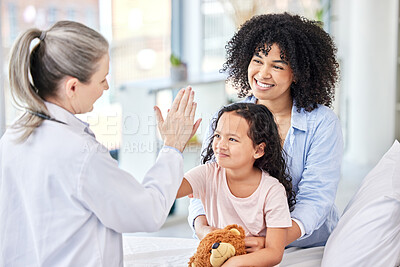 Buy stock photo Young girl, doctor and mother with high five in hospital or clinic for health, behavior and screening test. Pediatrician, child and professional in routine check up for growth, development or vaccine