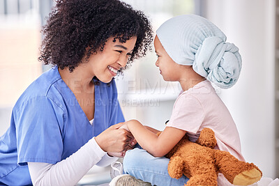 Buy stock photo Support, nurse and child holding hands on bed in hospital for children, health and smile at cancer treatment clinic. Pediatrics, healthcare and kids, nursing caregiver together with young patient.