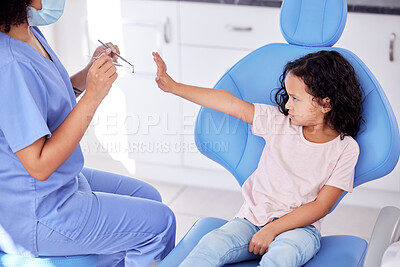 Buy stock photo Stop, scared and dentist with child patient for tooth extraction in clinic with consultation. Fear, dentistry and upset girl kid with pediatric orthodontist for cavity removal with equipment.