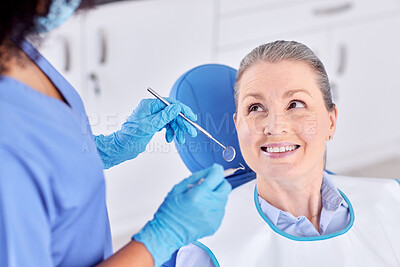 Buy stock photo Mature woman, patient and dentist with smile for dental surgery in clinic for teeth whitening and treatment with doctor. People, satisfied and happy on consultation for canal procedure and oral care
