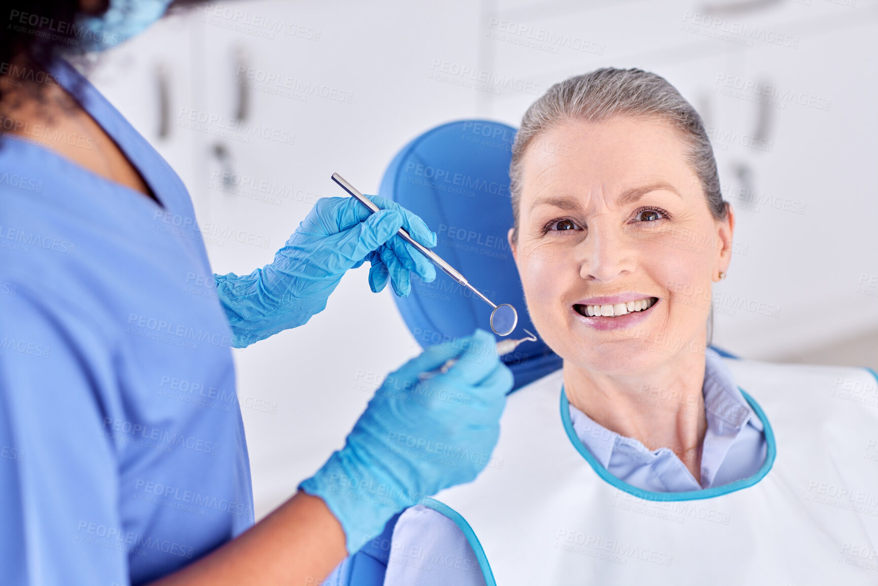 Buy stock photo Mature woman, patient and happy with dentist for dental surgery in clinic for teeth whitening and treatment with doctor. People, portrait and smile on consultation for canal procedure and oral care
