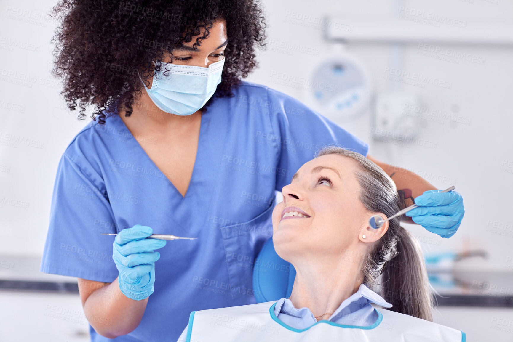 Buy stock photo Mature woman, patient and happy with dentist for oral care in clinic for teeth whitening and treatment. People, satisfied and smile on consultation for canal procedure or dental surgery with doctor