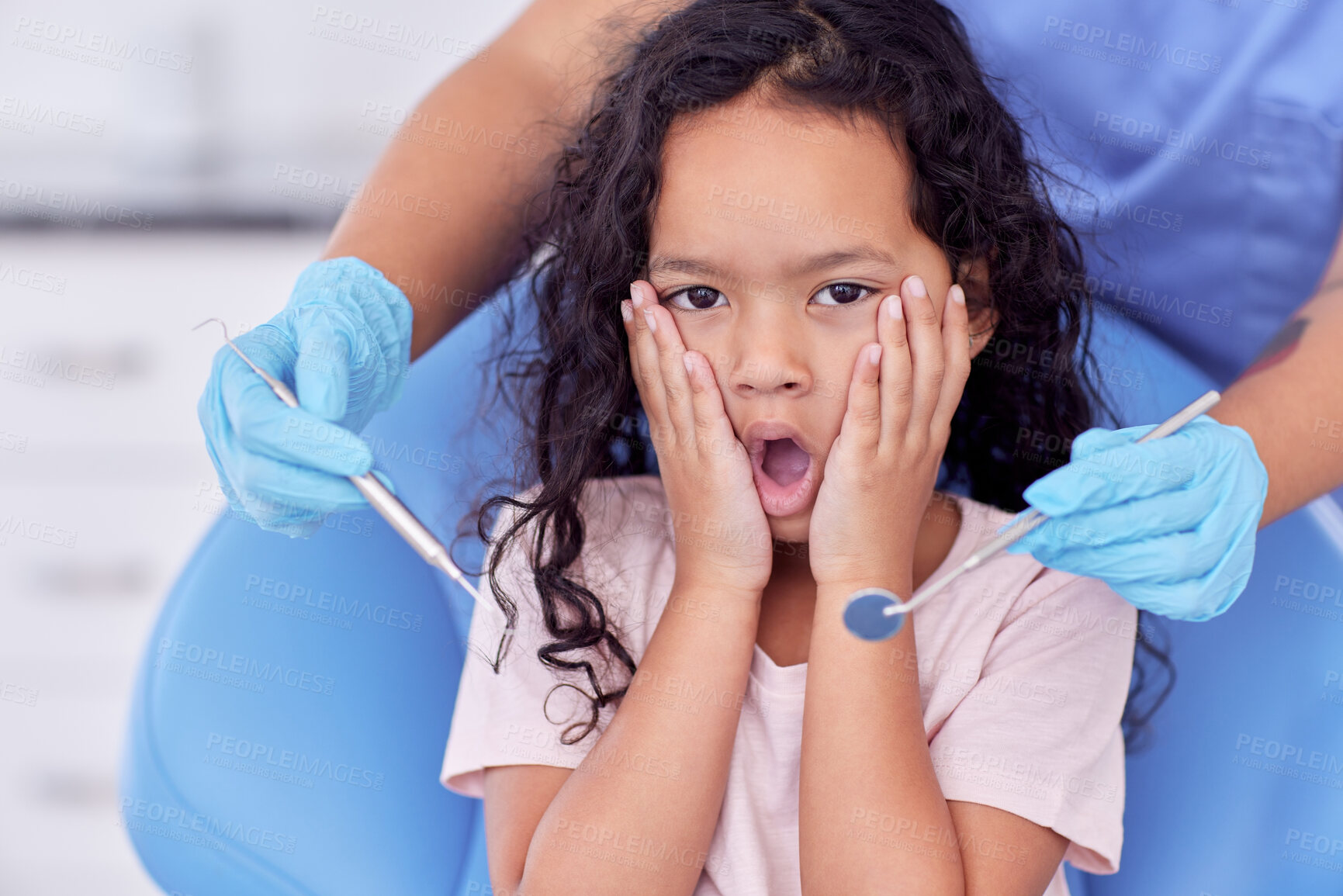 Buy stock photo Scared kid, portrait or hands of dentist with tool for dental health, teeth cleaning or cavity treatment for oral hygiene. Pediatric clinic, girl or worried child with fear for medical consultation