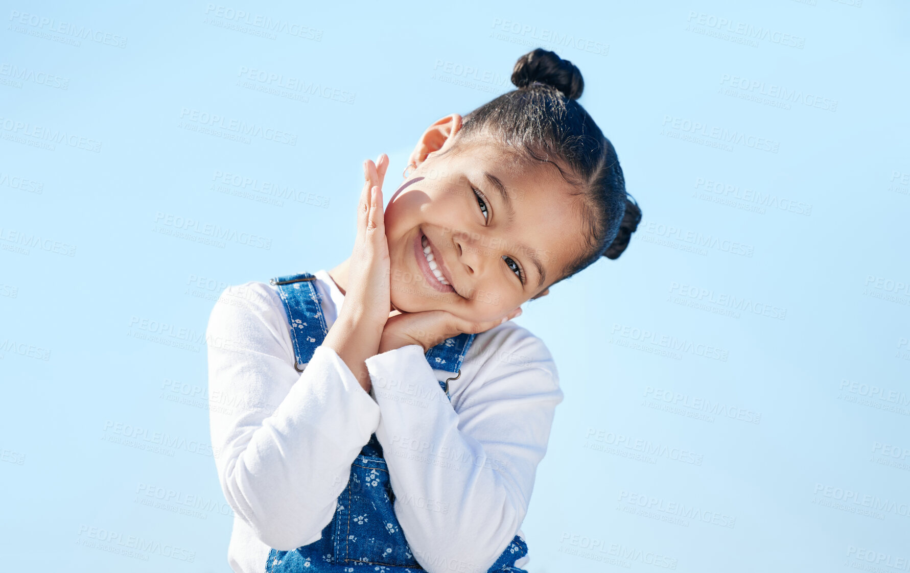 Buy stock photo Portrait, girl and child or happy in studio with confidence, pride and adorable in casual fashion. Kid, face and smile with trendy outfit, positive expression or shy on blue background mockup space