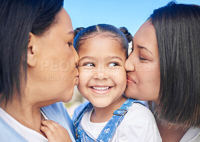 Buy stock photo Mom, grandmother and kiss for girl, child and happy together with generations, love and sunshine in park. People, family and connection on vacation, outdoor and Mothers Day celebration in nature