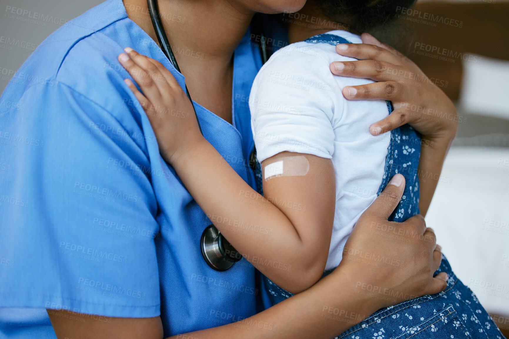 Buy stock photo Healthcare, nurse and child with plaster in hospital for vaccine, immune booster and hug for comfort. Medical, professional and embrace kid with bandage for injection, wellness checkup or appointment