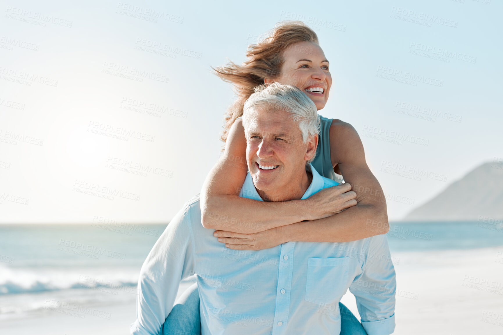 Buy stock photo Love, piggyback and walking with old couple at beach for travel destination, summer and anniversary vacation. Relax, tropical and retirement with senior people for holiday, bonding and romance