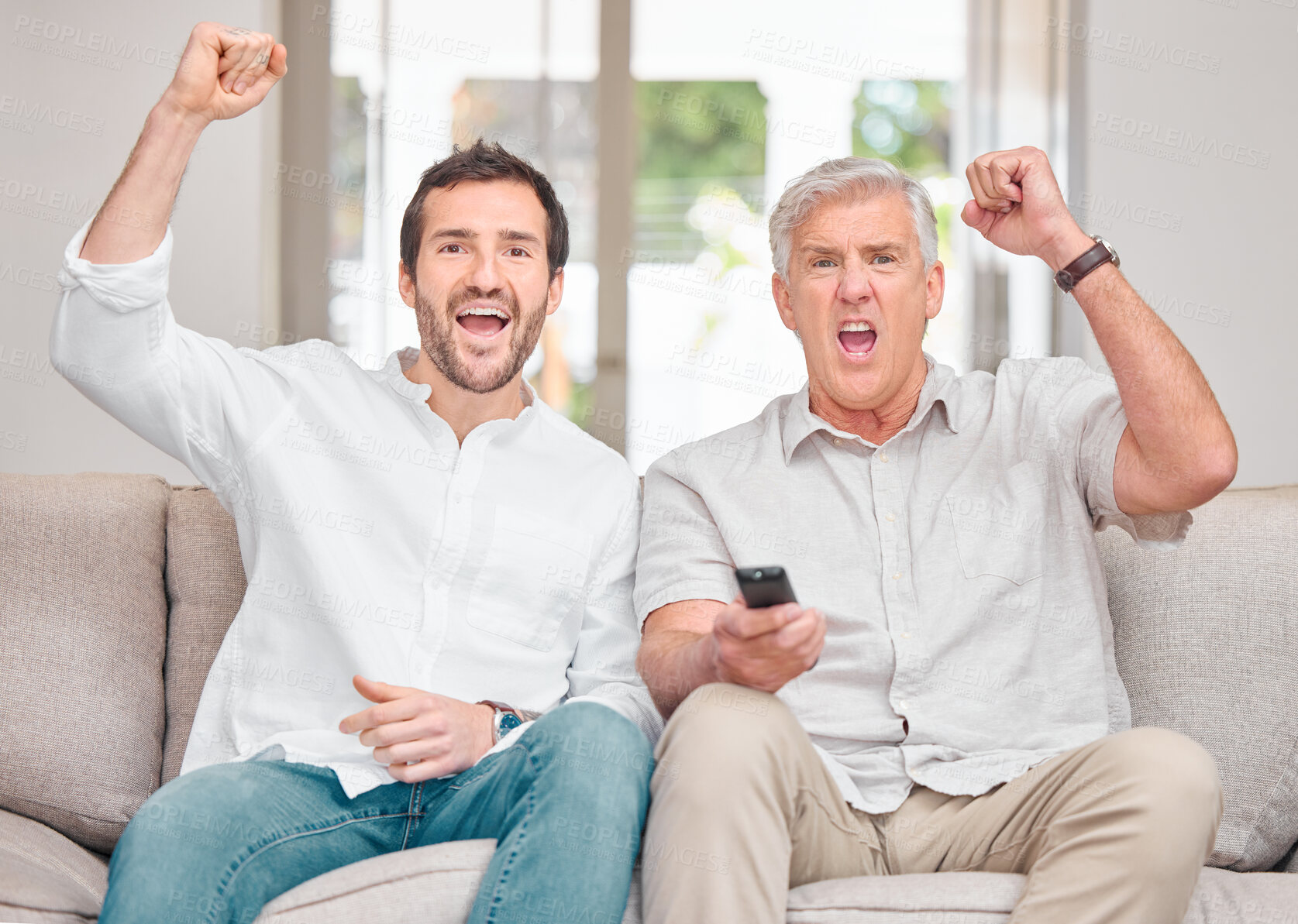 Buy stock photo Mature dad, son and celebration with watching tv for sports games, tournament and match, People, parent and excited or happy with fist for winning, goal and support as fan with fun, bonding and home