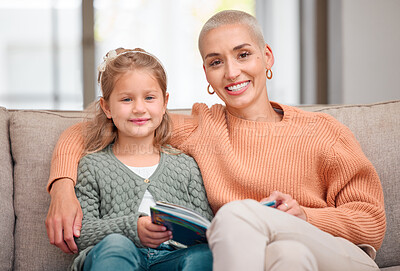 Buy stock photo Portrait of a daughter and mother bonding on the sofa together at home