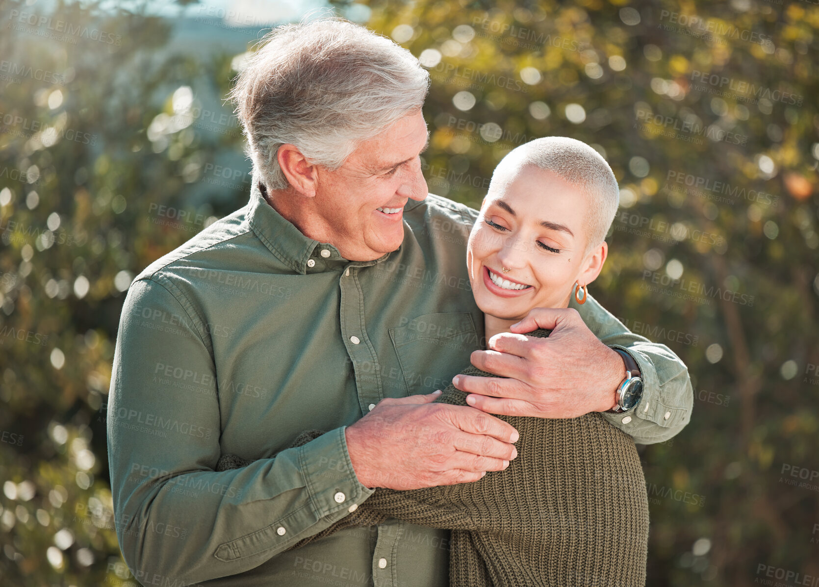 Buy stock photo Family, hug and father with adult daughter, outdoor and smile with happiness, bonding together and care. Nature, single parent and dad with girl, embrace and fun with love, cheerful or joyful in park